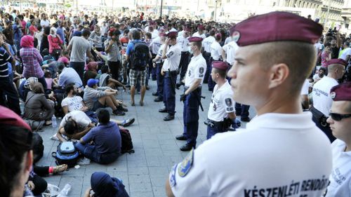 Protests as Budapest closes main train station to migrants