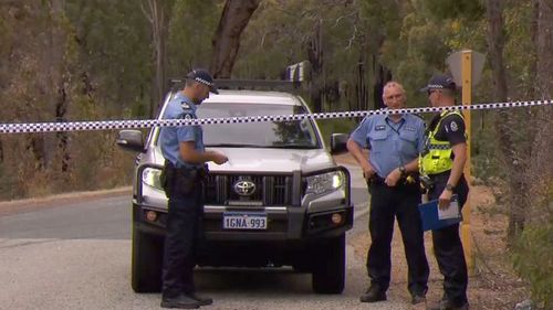 A crime scene is still set up in bushland as police search for clues on what happened to Kym Taylor 