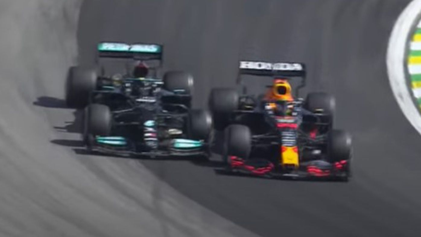 Max Verstappen and Lewis Hamilton almost collide during the Brazilian Grand Prix.