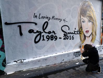A mural by Melbourne graffiti artist Lushsux is seen in Hosier Lane on July 20, 2016 in Melbourne, Australia. The mural was painted in response to the current social media spat between Taylor Swift and Kim Kardashian. Kardashian released a recording this week of her husband Kanye West speaking to Swift about his lyrics referring to her in his song 'Famous.' Swift has denied she approved the lyrics about her.