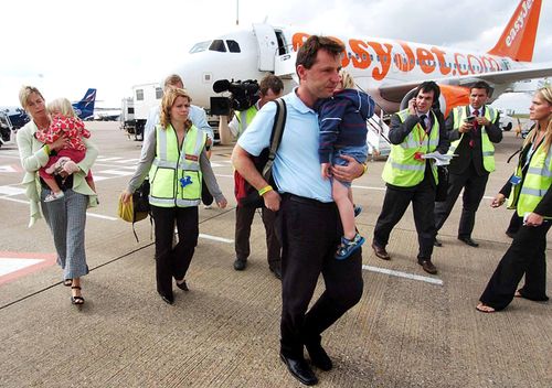 Kate and Gerry McCann, with twins Sean and Amelie, arrive at East Midlands airport in England in September 2007, after leaving Portugal.