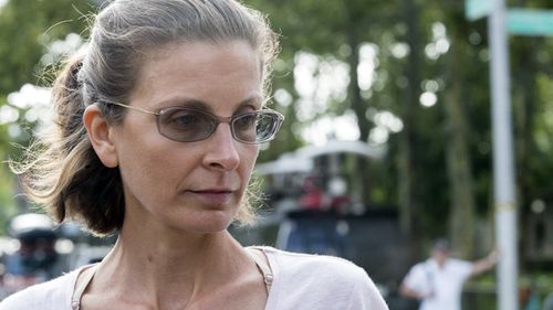 Clare Bronfman, a daughter of the late billionaire philanthropist and former Seagram chairman Edgar Bronfman Sr., and three other people associated with the NXIVM organisation were taken into custody and charged with racketeering conspiracy. (AAP)