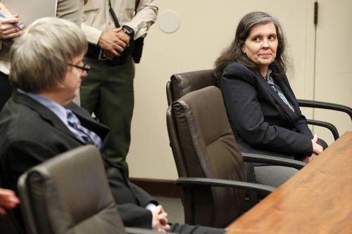  Louise Turpin (R) and her husband David Turpin (R) during a court appearance in Riverside, California, USA. (AAP)