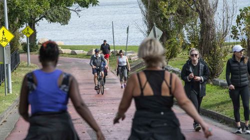 Walkers, runners and cyclists on the Bay Run in Rozelle, Sydney.