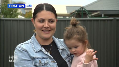 23-month-old Nayvah and her mother Samantha Walkey after the little was rescued from a drain.