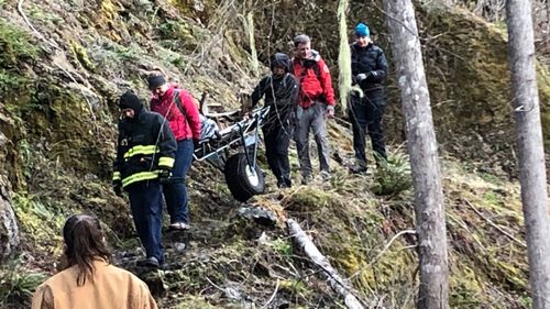 Joe Oldendorf being prepared by emergency services in the Duckabush Trail at Olympic National Park in Washington.