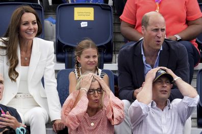 Prince Edward, right and Sophie, Countess of Wessex react with Prince William, Princess Charlotte and Kate, Duchess of Cambridge seated behind as they follow the action, at the University of Birmingham Hockey and Squash Center on day five of the 2022 Commonwealth Games in Birmingham , England, Tuesday, Aug. 2, 2022 