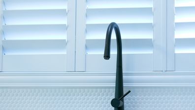 Plantation shutters in a kitchen. 