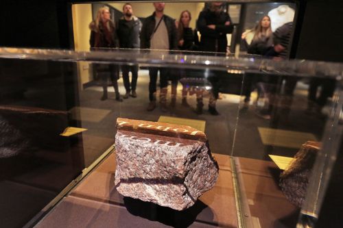 A fragment of a memorial fountain, that was constructed after Feb. 26, 1993 truck bomb attack at the World Trade Center and was destroyed on Sept. 11, 2001, is displayed at the National September 11 Museum, in New York, Friday, Feb. 23, 2018. It was a terror attack that foreshadowed Sept. 11: the deadly World Trade Center bombing that happened 25 years ago Monday. (AP Photo/Richard Drew)