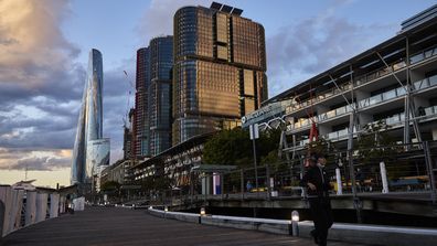  A runner is seen at Darling Harbour on July 15, 2021 in Sydney, Australia. 