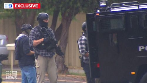 Nine News cameras captured the moment armed TRG officers stormed a home in Armadale bringing to an end a dramatic four day manhunt.