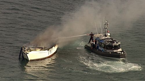 News Queensland yacht fire Moreton Island Brisbane news Australia