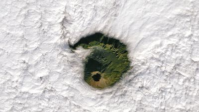 Mount Vesuvius peeks through the clouds
