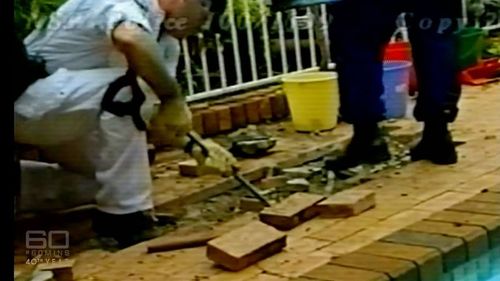 Police searched under the paved area around the pool at the Bayview home in 1999.