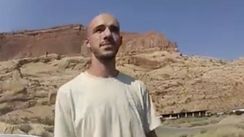 This police camera video provided by The Moab Police Department shows Brian Laundrie  talking to a police officer after police pulled over the van he was traveling in with Gabby Petito, near the entrance to Arches National Park on August 12, 2021.