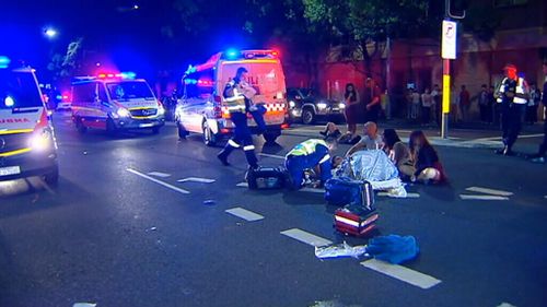 Emergency services assist at the scene. (9NEWS)