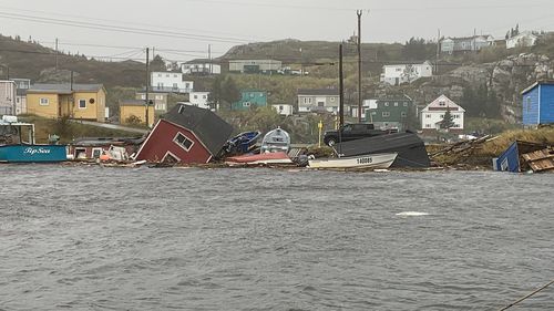 This photo provided by Pauline Billard shows destruction caused by Hurricane Fiona in Rose Blanche, 45 kilometers (28 miles) east of Port aux Basques, Newfoundland and Labrador, Saturday, Sept. 24, 2022. (Pauline Billard via AP)