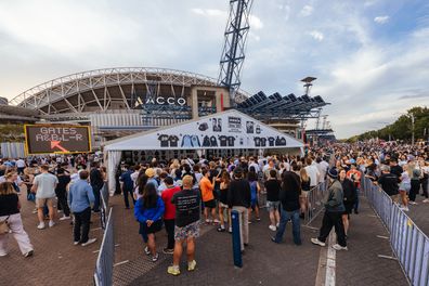 Excited fans arrive at Accor Stadium to see Oasis as part of their Live '25 global tour in Sydney Australia
