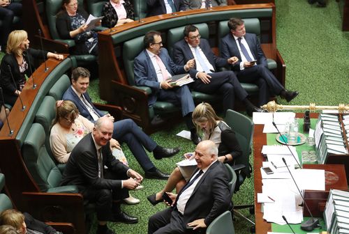 Members take their seats to vote on an amendment to the Voluntary Assisted Dying Bill 2017 as it is debated in the lower house at the Victorian Parliament.