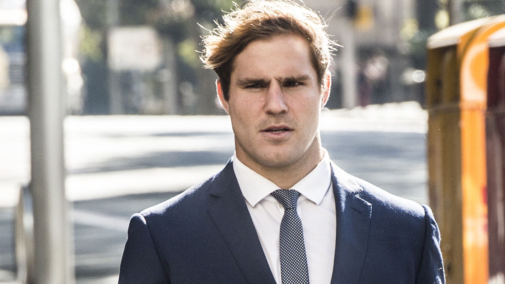 Jack de Belin arrives at Downing Centre Local &amp; District Court in Sydney.