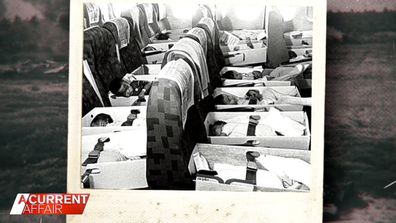 Vietnamese children were carried or hurried onto the aircraft.