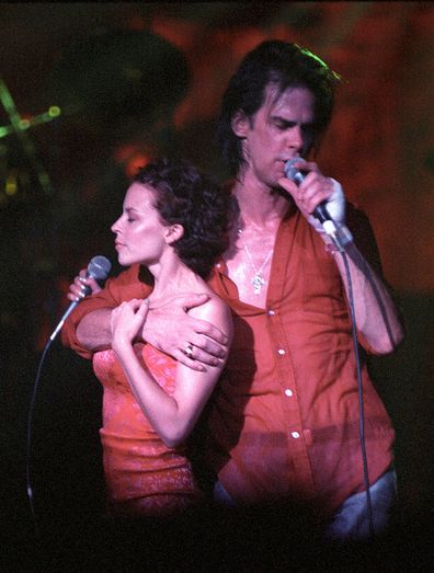 Kylie Minogue performing With Nick Cave And The Bad Seeds in 1996 at Brixton Academy, London.