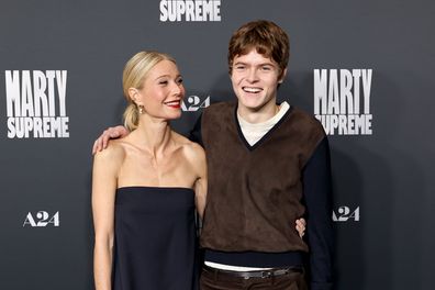 BEVERLY HILLS, CALIFORNIA - DECEMBER 08: (L-R) Gwyneth Paltrow and Moses Martin attend the Los Angeles premiere of A24's "Marty Supreme" at Samuel Goldwyn Theater on December 08, 2025 in Beverly Hills, California. (Photo by Monica Schipper/Getty Images)