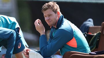 Steve Smith of Australia reacts after being struck on the finger in the nets during a session at Edgbaston.
