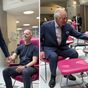 King holds hands of cancer patients on return to public duties