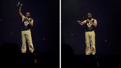 Drake catching book fan threw at him during concert