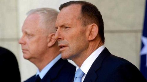 Prime Minister Tony Abbott and Air Chief Marshal Mark Binskin announce combat in Iraq to start in coming days. (AAP)