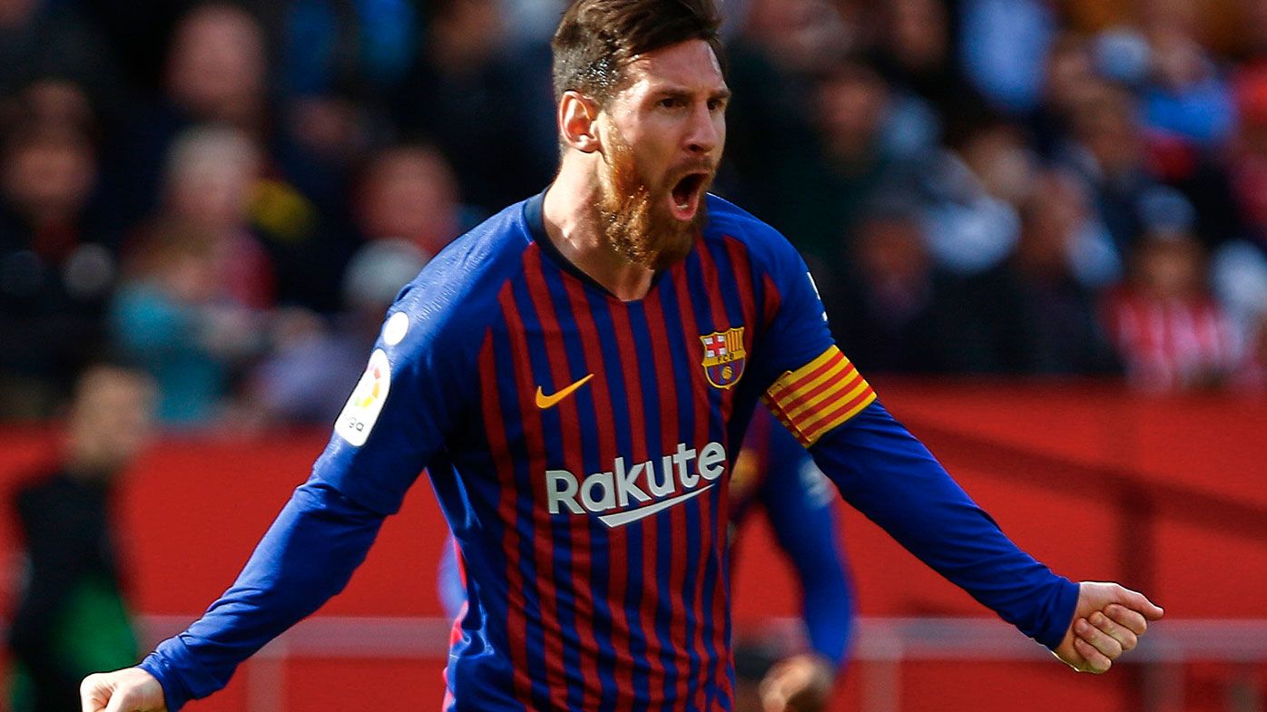 Lionel Messi celebrates his hat trick