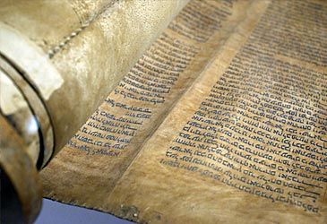 Who is credited with writing down the Torah?