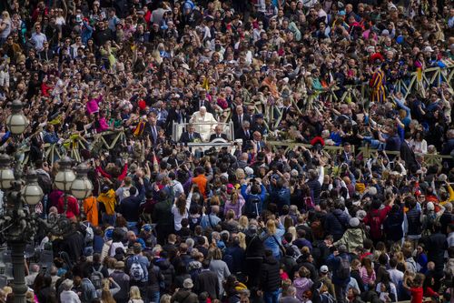 Pope Francis leaves after celebrating the Palm Sunday's mass in St. Peter's Square at The Vatican Sunday, April 2, 2023