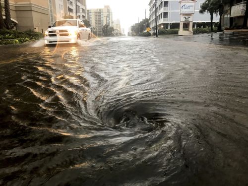 The storm drains were unable to keep up with the constant deluge of rain in North Myrtle Beach, S.C. with local flash flooding occurring on many roads ahead of Hurricane Dorian. Thursday Sept. 05, 2019.