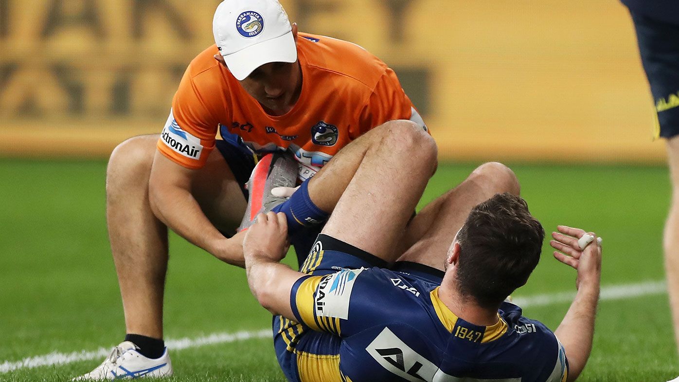 Eels star Mitchell Moses is treated for a calf injury in Parramatta&#x27;s win over Canberra.