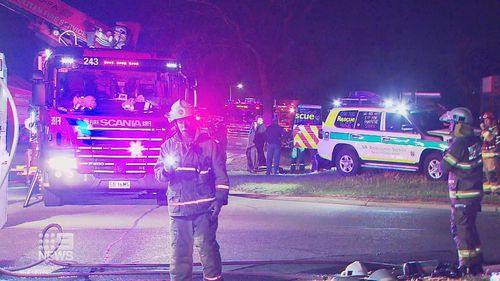 Emergency services on the scene of the suspected arson attack on an Adelaide home.