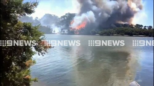 Fire crews battled through the night. (9NEWS)