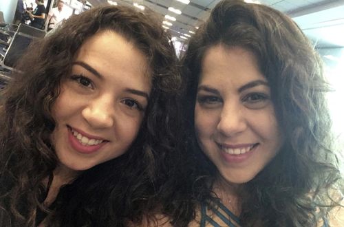This photo provided by Neima Benavides, right, shows her and her sister, Naibel Benavides Leon in the Dominican Republic in 2018, celebrating Naibel's 21st birthday. (Neima Benavides via AP)