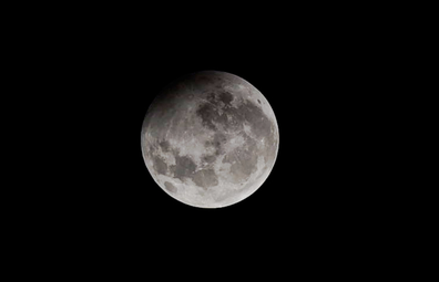 Maximum phase of Penumbral Lunar eclipse at Nehru Planetarium, on January 10, 2020 in Mumbai, India.