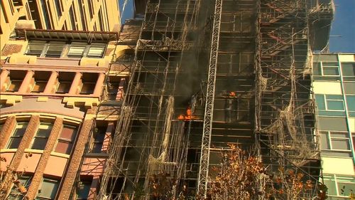 The blaze has stripped bare the exterior of the under construction building. Picture: 9NEWS