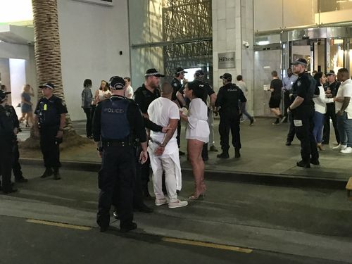 A non-Schoolie is arrested. (Shellie Doyle)