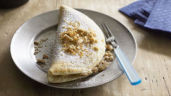 Fluffy pancakes with roasted peanuts and sesame seeds (Ban chang kuih)