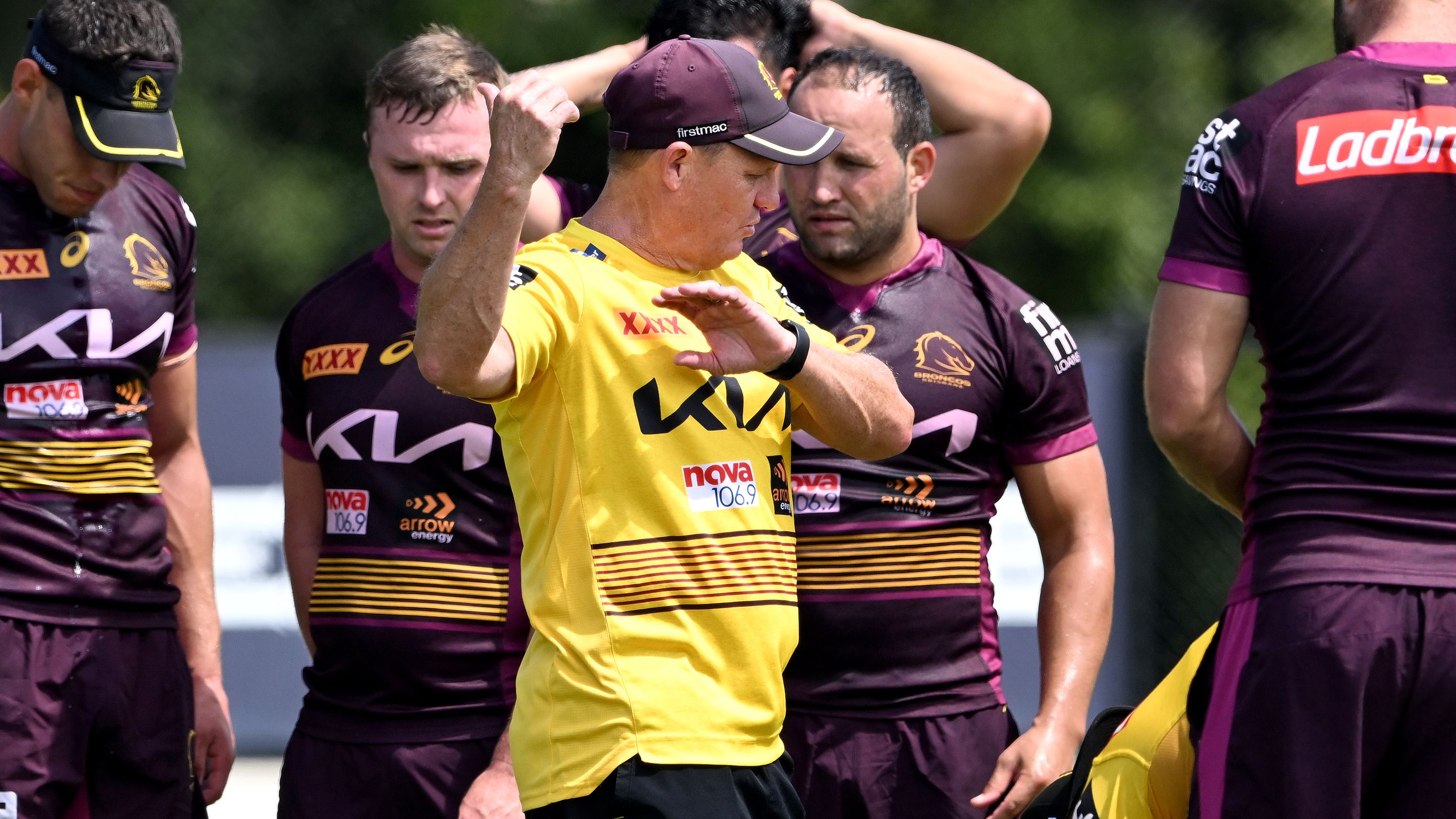 Coach Kevin Walters talks to his players during a Brisbane Broncos NRL training session at Clive Berghofer Centre.