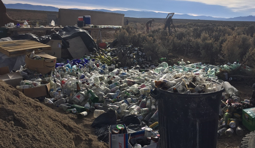 Empty glass bottles - just one of the materials used in construction of earthships. (9NEWS)