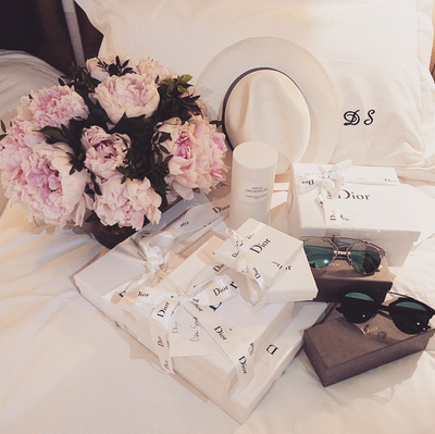 <p>Guests were greeted by a Dior gift bag and posy of peonies.</p>