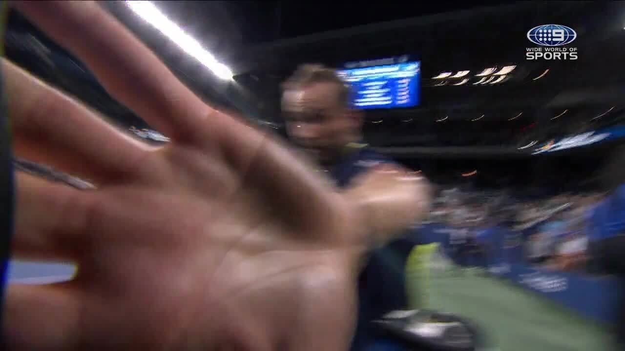 Daniil Medvedev swipes a camera after losing the third set to Chris O&#x27;Connell.