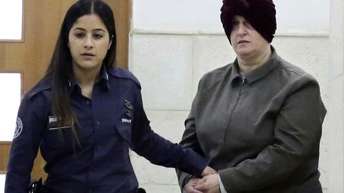 Israeli-born Australian Malka Leifer, right, is brought to a courtroom in Jerusalem on Feb. 27, 2018. 