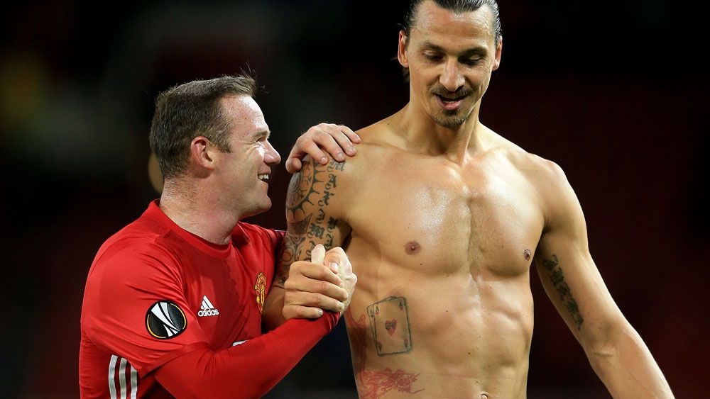 Wayne Rooney and Zlatan Ibrahimovic celebrate at fulltime. (AAP)