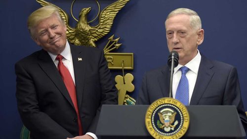 Donald Trump listens to Defence Secretary James 'Mad Dog' Mattis. (AP)